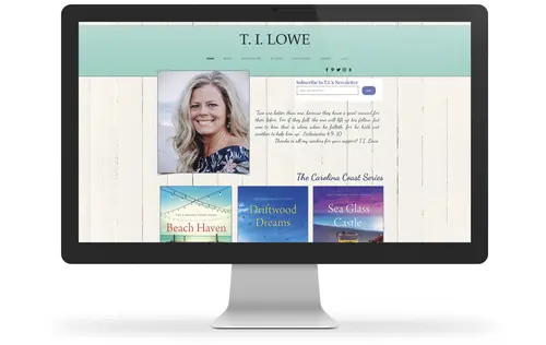 a monitor displaying T. I. Lowe’s website