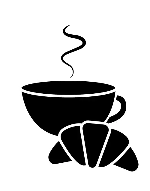 Coffee cup and croissant